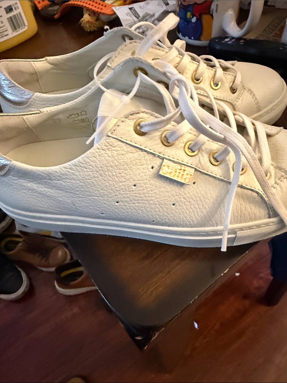 White Leather Low-Top Sneakers with Gold Eyelet Details